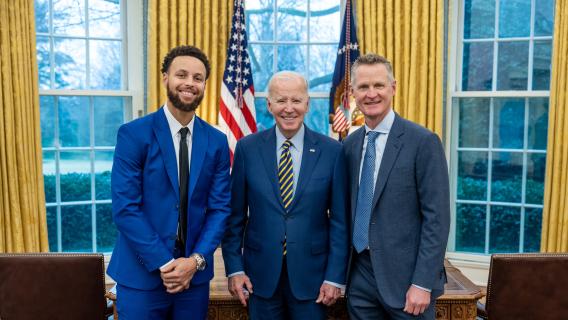 Photo of President Joe Biden with Golden State Warriors guard Steph Curry (left) and head coach Steve Kerr (right) on Jan. 17, 2023, before an event celebrating the team’s 2022 NBA championship.